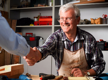 Image of a man shaking someones hand