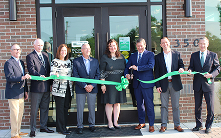 Board of Directors cutting ribbon