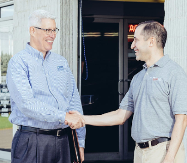 Image of Steve Stiffler shaking hands with a customer