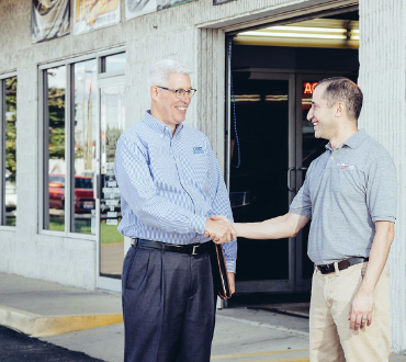 Image of Steve Stiffler shaking hands with a customer