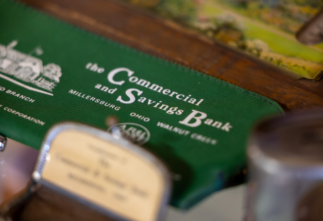 Vintage CSB banking pouch with Millersburg and Walnut Creek locations listed.