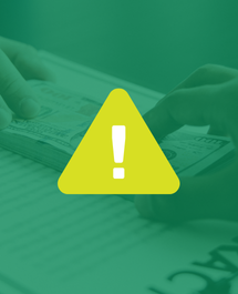 Green background with yellow alert icon